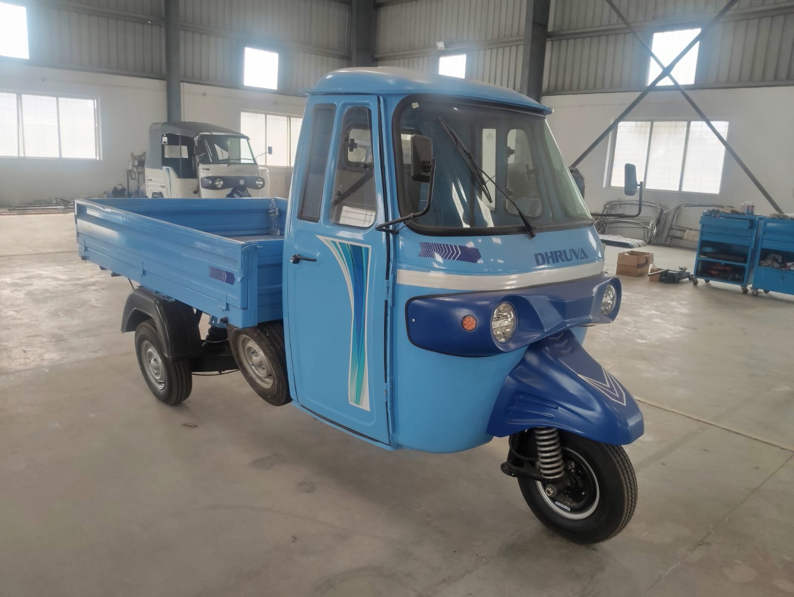 Dhruva electric three-wheeler cargo loader supplied through Ad Value Global EV dealership network
